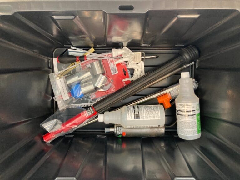 soil sampling supplies in a bucket.