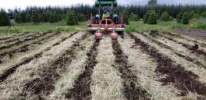 a field with a tractor.