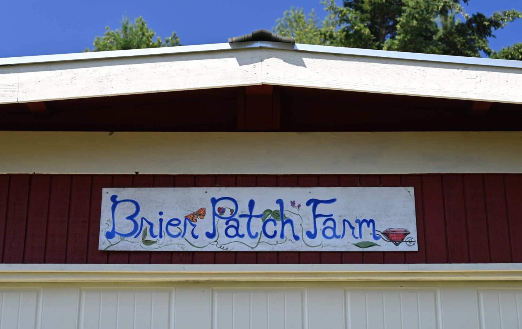 a sign that reads Brier Patch Farm.