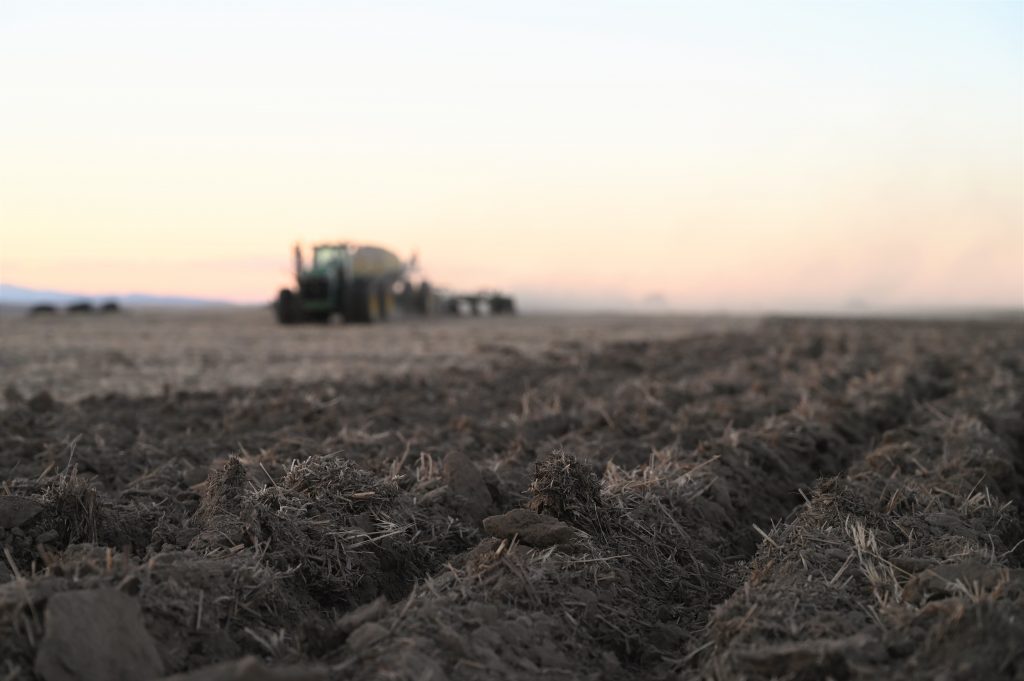 a tractor in a field.