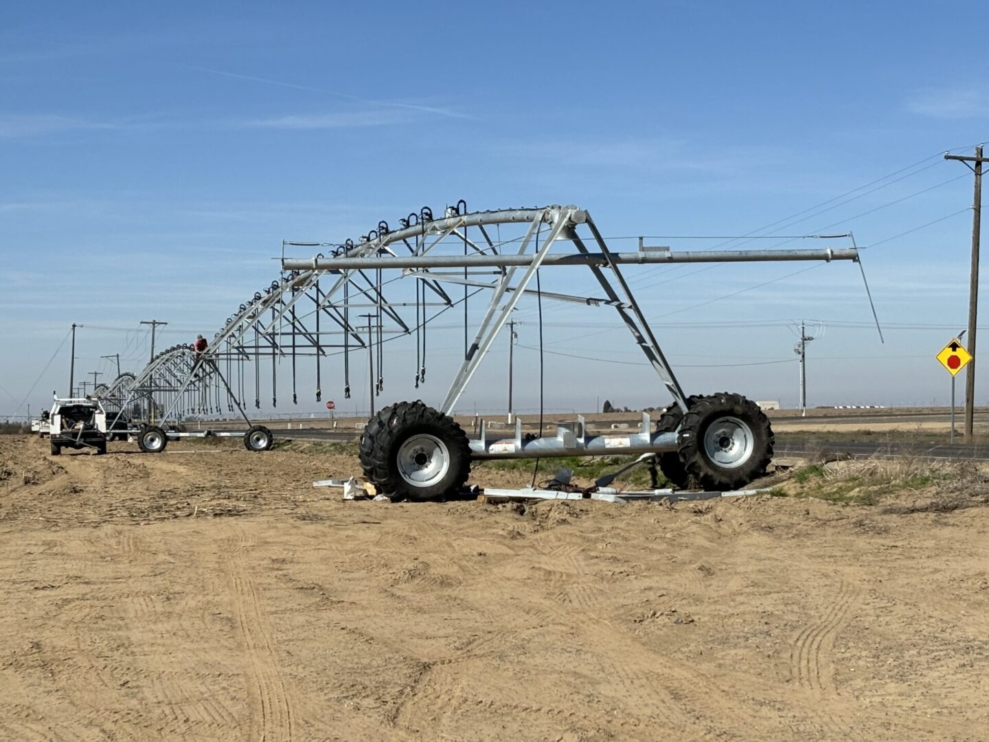 an pivot irrigation set up in a field.